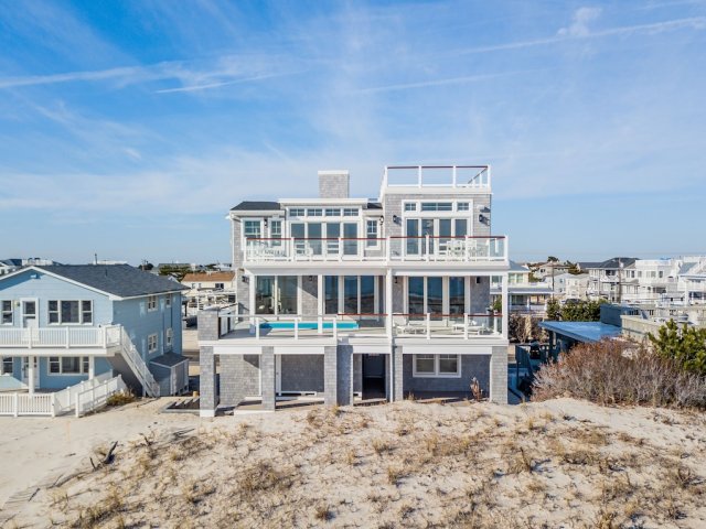 Beachfront with in-deck pool, panoramic views & private beach access
