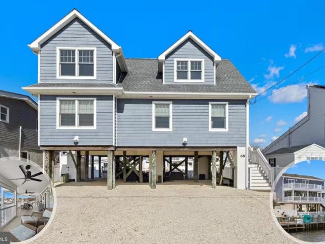 Coastal Luxury Home w Dock + Panoramic Views
